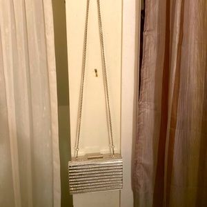 Silver Strap Clutch with Long Chain.